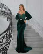 Celeste Maxi Dress by Lauven, elegant deep green velvet evening gown with sequin detailing and flattering silhouette.