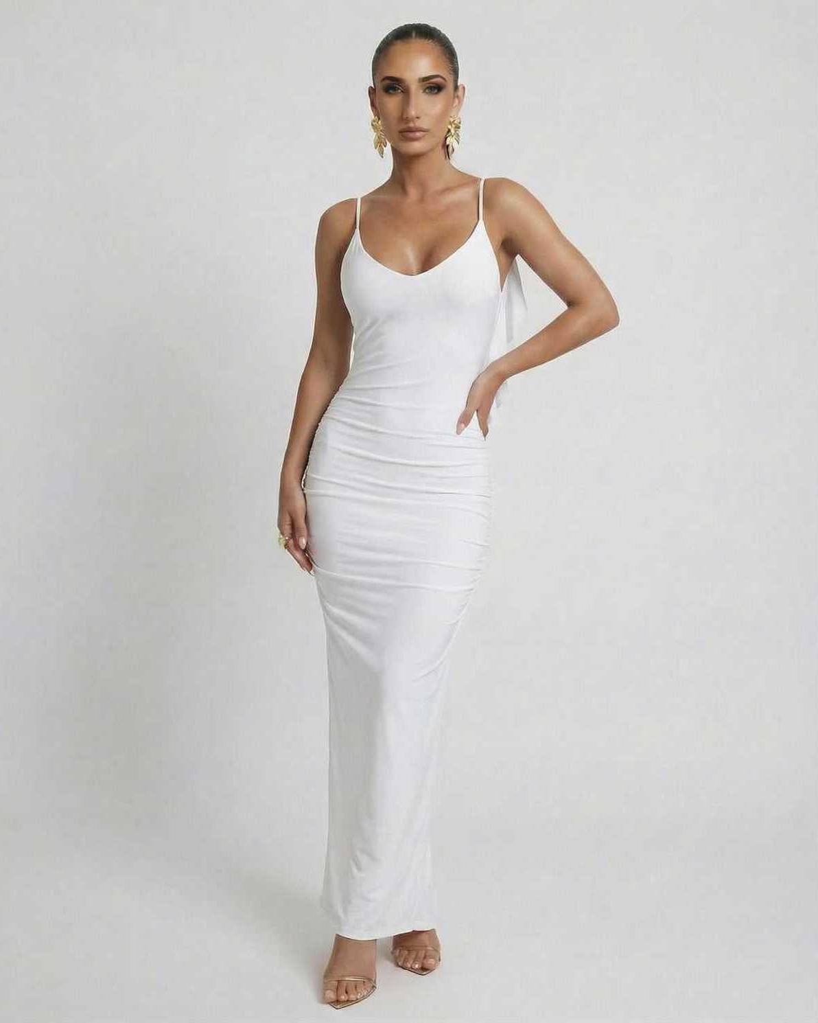 Celeste Maxi Dress by Lauven, elegant white sleeveless bodycon with spaghetti straps and a deep backless design.