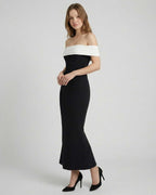 Celeste Maxi Dress by Lauven, elegant off-shoulder black dress with white neckline and flattering A-line silhouette.