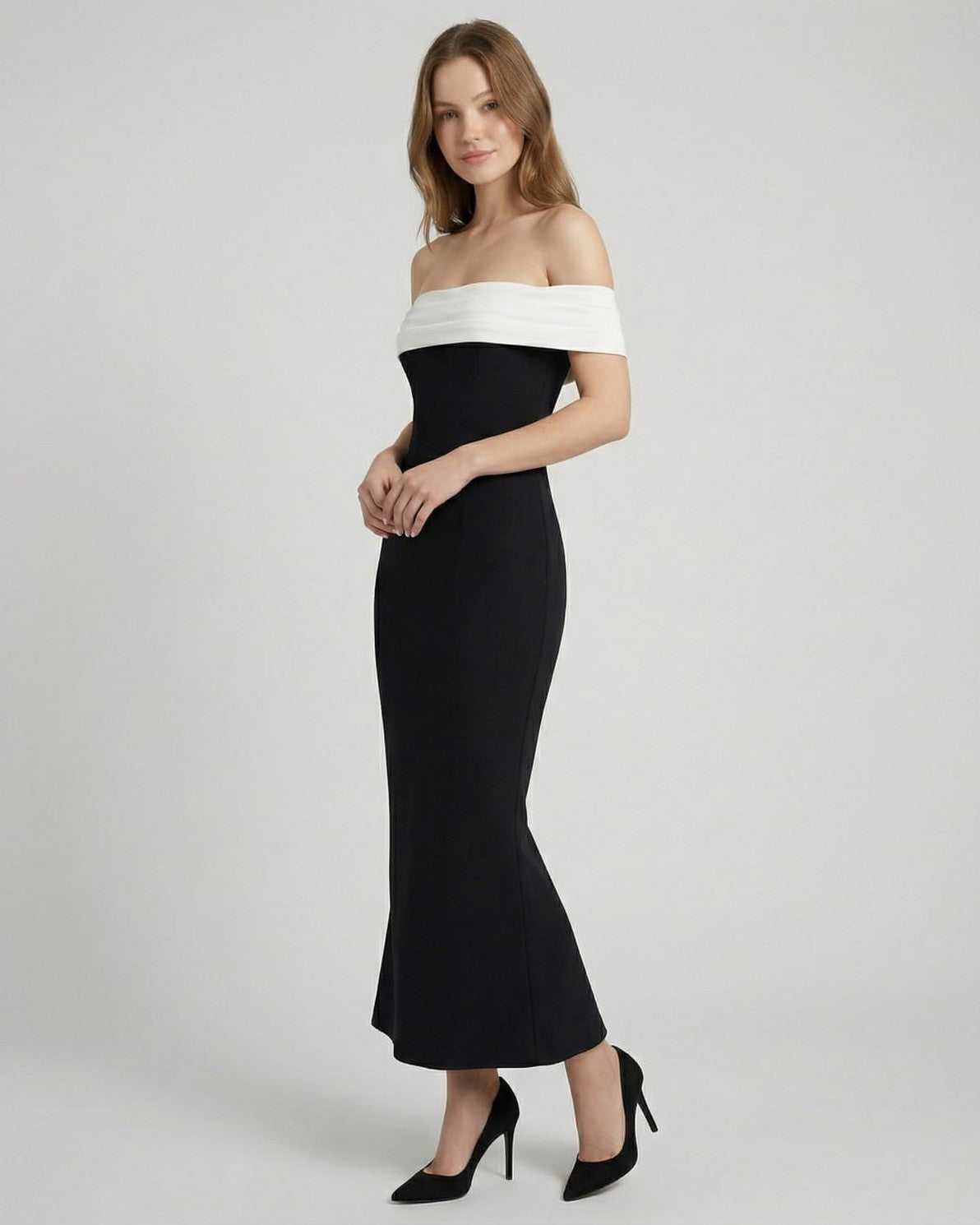 Celeste Maxi Dress by Lauven, elegant off-shoulder black dress with white neckline and flattering A-line silhouette.