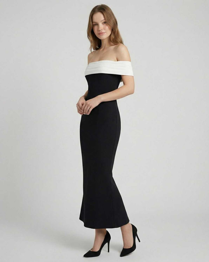 Celeste Maxi Dress by Lauven, elegant off-shoulder black dress with white neckline and flattering A-line silhouette.
