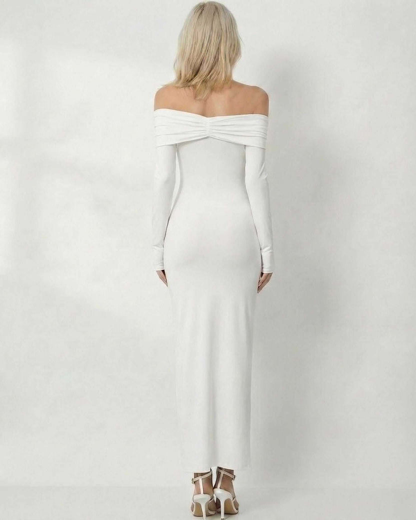 Celeste Maxi Dress by Lauven, showcasing sleek off-shoulder design and a flattering white sheath silhouette from the back.