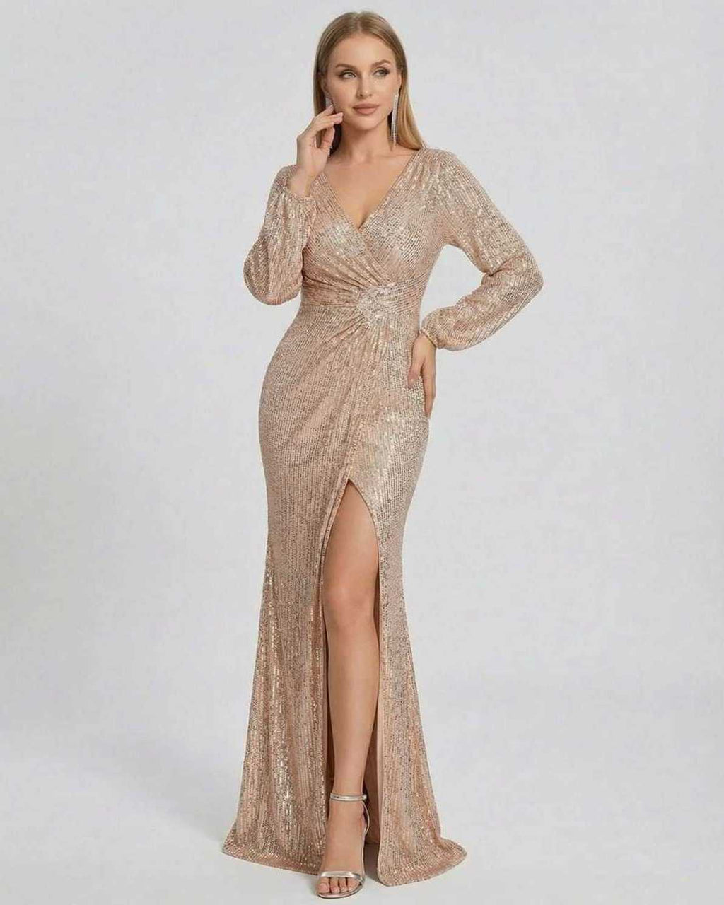 Celeste Maxi Dress by Lauven in shimmering gold sequins with a flattering V-neckline and elegant slit.