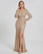 Celeste Maxi Dress by Lauven in shimmering gold sequins with a flattering V-neckline and elegant slit.