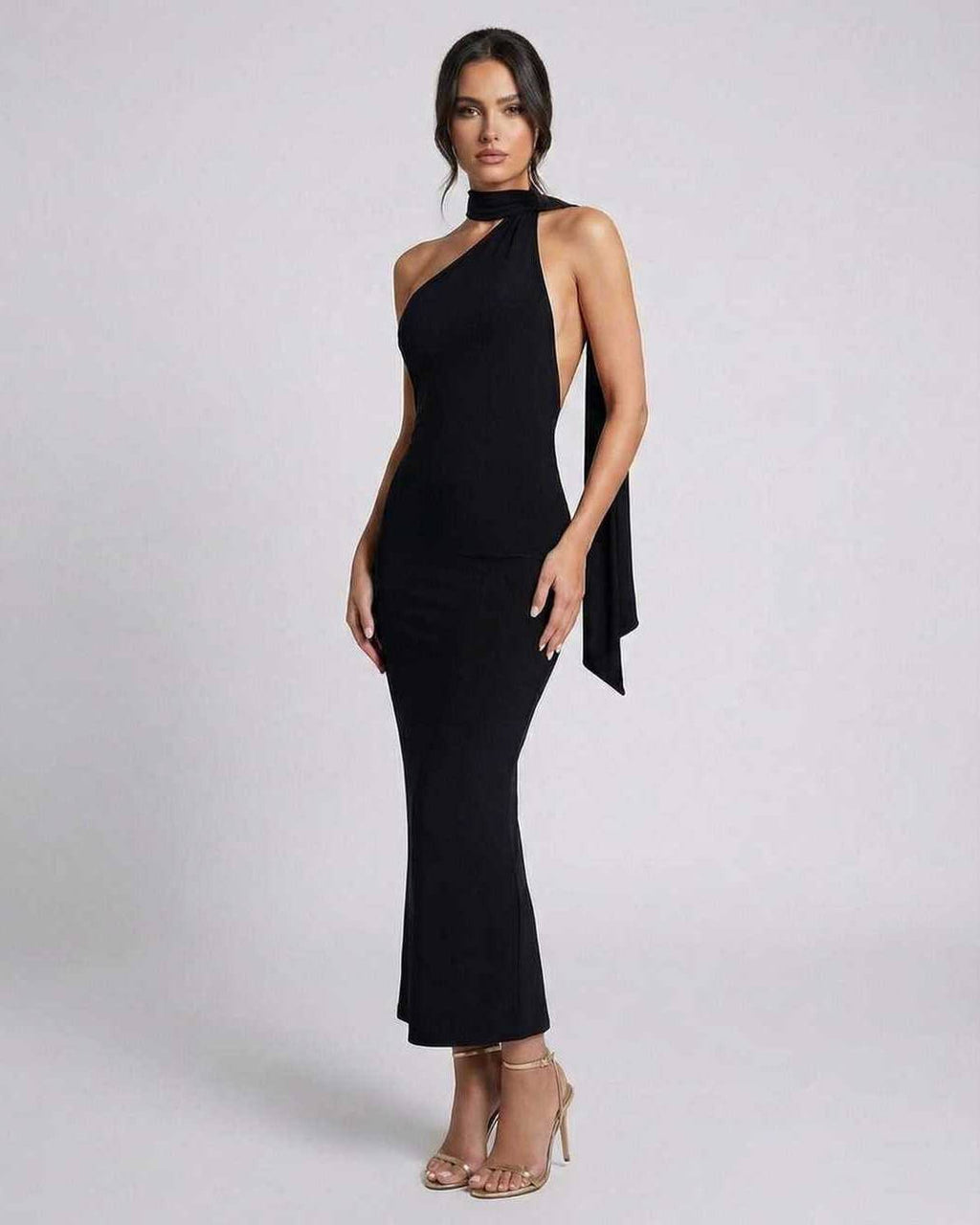 Celeste Maxi Dress by Lauven, elegant black halter neck evening dress with a sleek silhouette.