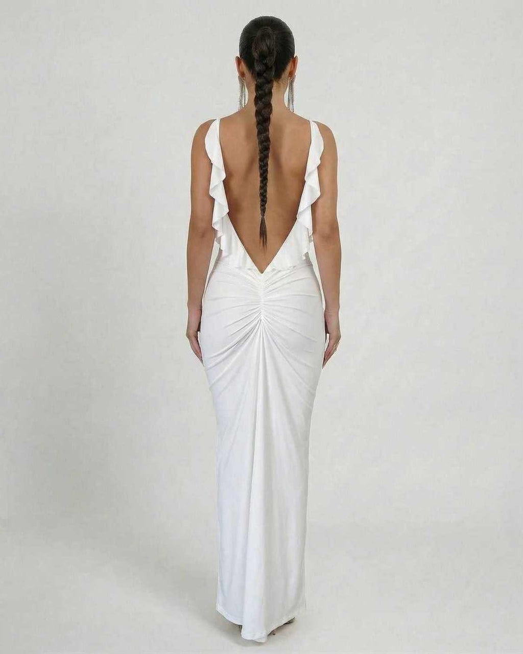 Celeste Maxi Dress by Lauven, elegant white sleeveless bodycon with a deep backless design and flattering silhouette.