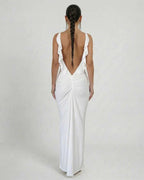 Celeste Maxi Dress by Lauven, elegant white sleeveless bodycon with a deep backless design and flattering silhouette.