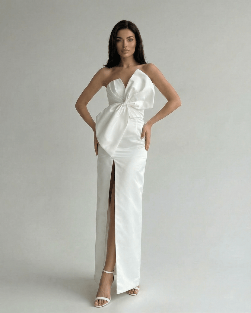 Celeste Maxi Dress by Lauven - elegant white strapless satin gown with front slit and sculpted silhouette.