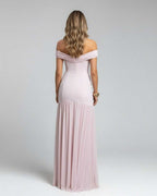 Back view of Celeste Maxi Dress by Lauven, an elegant off-shoulder evening gown in soft pink with flowing skirt.
