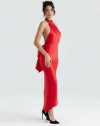 Celeste Maxi Dress by Lauven, elegant red satin gown with a sleek silhouette and asymmetrical bell skirt.