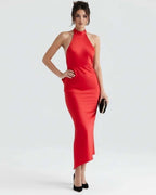 Celeste Maxi Dress by Lauven - Elegant red satin evening gown with a sleek silhouette and asymmetrical bell skirt.