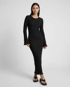 Lauven Celeste Maxi Dress - Elegant ribbed knit midi dress with ruffle details, long flared sleeves in black.