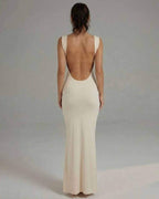 Celeste Maxi Dress - Sleek sleeveless design with backless detail, elegant cream color by Lauven.