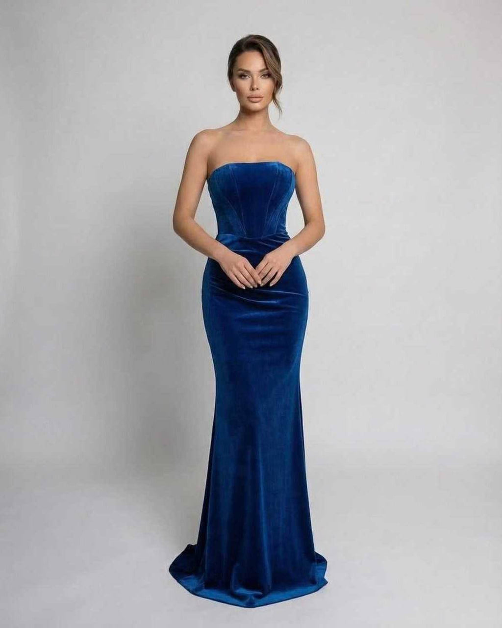 Celeste Maxi Dress by Lauven, a strapless velvet evening gown in rich blue, showcasing modern elegance and luxury.