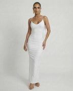 Lauven Celeste Maxi Dress - Elegant white sleeveless bodycon with spaghetti straps and smooth fit.