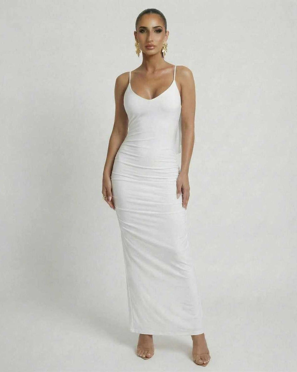 Lauven Celeste Maxi Dress – Elegant white sleeveless bodycon with spaghetti straps and smooth fit.