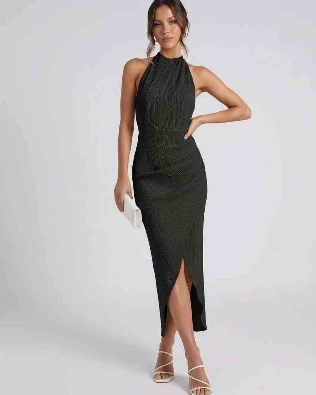 Celeste Midi Dress by Lauven, elegant black halter neck evening dress with tasteful slit.