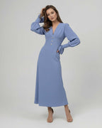 Celeste Midi Dress, blue long sleeve A-line dress by Lauven, featuring a V-neckline and flattering silhouette.