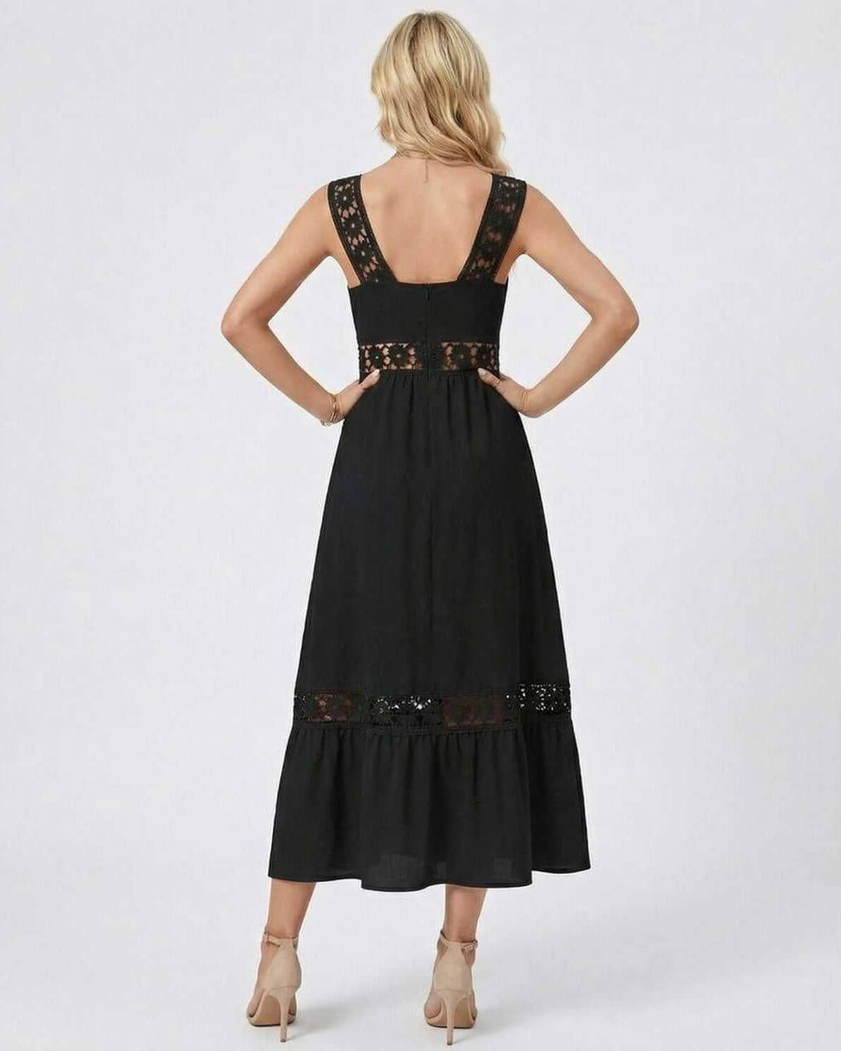 Back view of the Celeste Midi Dress by Lauven featuring elegant lace insets and a flowy hemline.