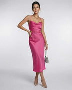 Celeste Midi Dress by Lauven – Elegant pink satin with cutout design, perfect for evening events.