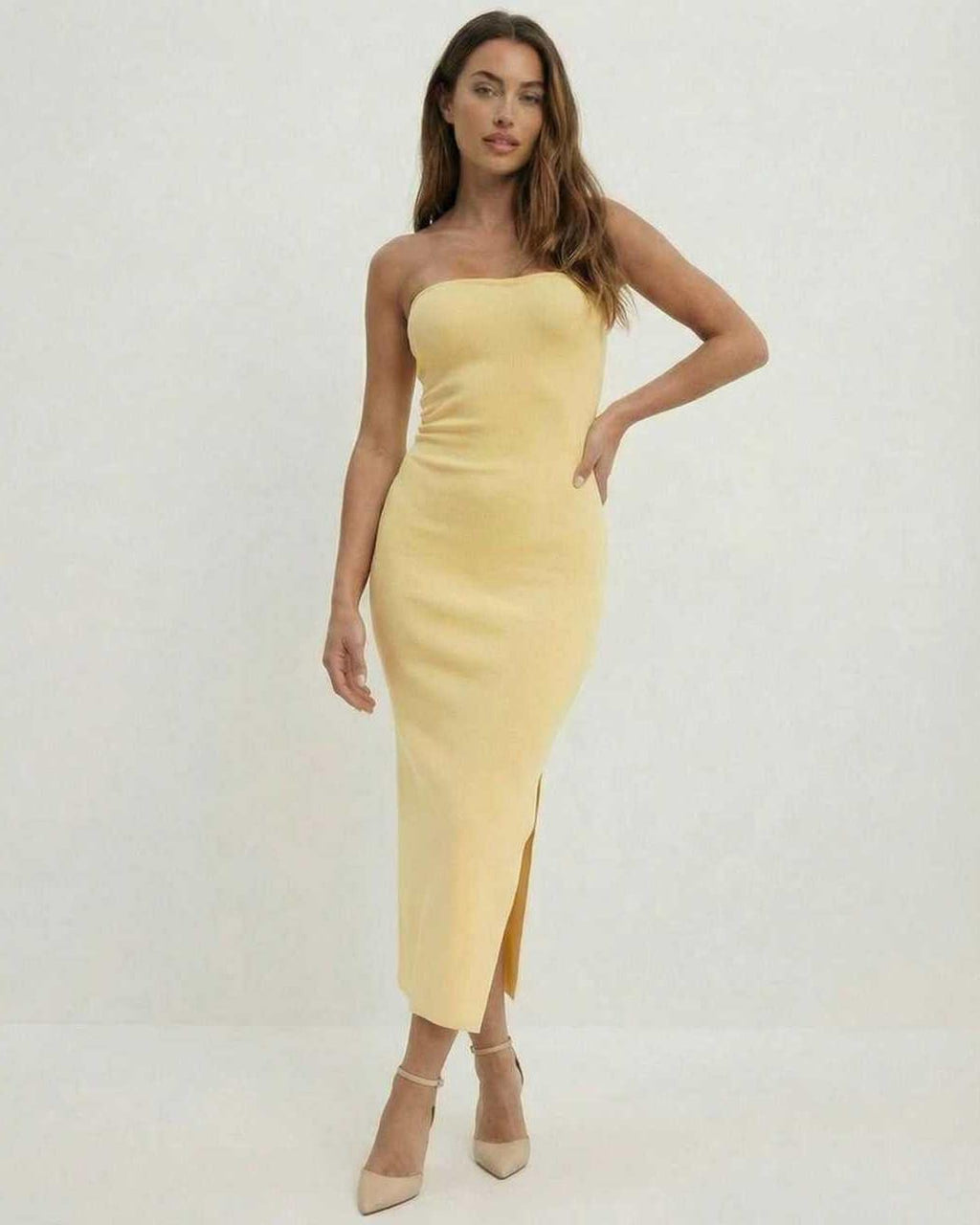 Lauven Celeste Midi Dress in soft yellow, strapless sheath with mid-calf length and side slit, perfect for Spring 2024.