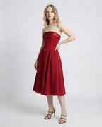 Celeste Midi Dress by Lauven — Strapless high-waist silhouette with pockets, perfect for elegant occasions.