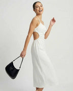Celeste Midi Dress by Lauven, featuring ruched sleeveless design and backless detail, perfect for chic occasions.