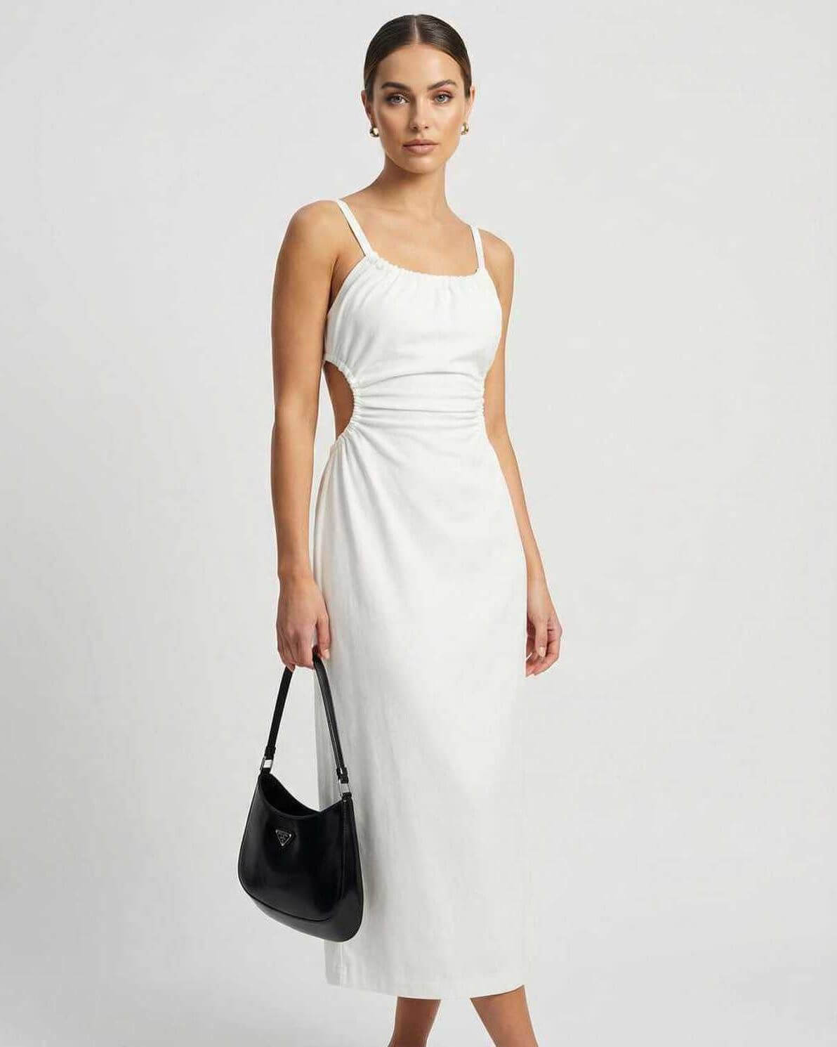 Celeste Midi Dress by Lauven showcasing ruched design and backless detail, perfect for luxury-loving women.