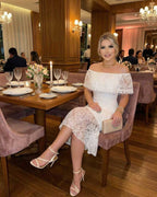 Celeste Midi Dress by Lauven featuring off-the-shoulder lace elegance, perfect for special occasions.