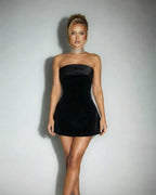 Celeste Mini Dress featuring a black velvet strapless design and satin band from Lauven, offering a sophisticated look.