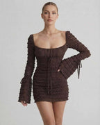 Celeste Mini Dress by Lauven in rich chocolate brown, featuring a fitted silhouette and elegant flare sleeves.