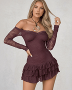 Celeste Mini Dress by Lauven in deep plum lace with ruffled hem and sheer long sleeves.