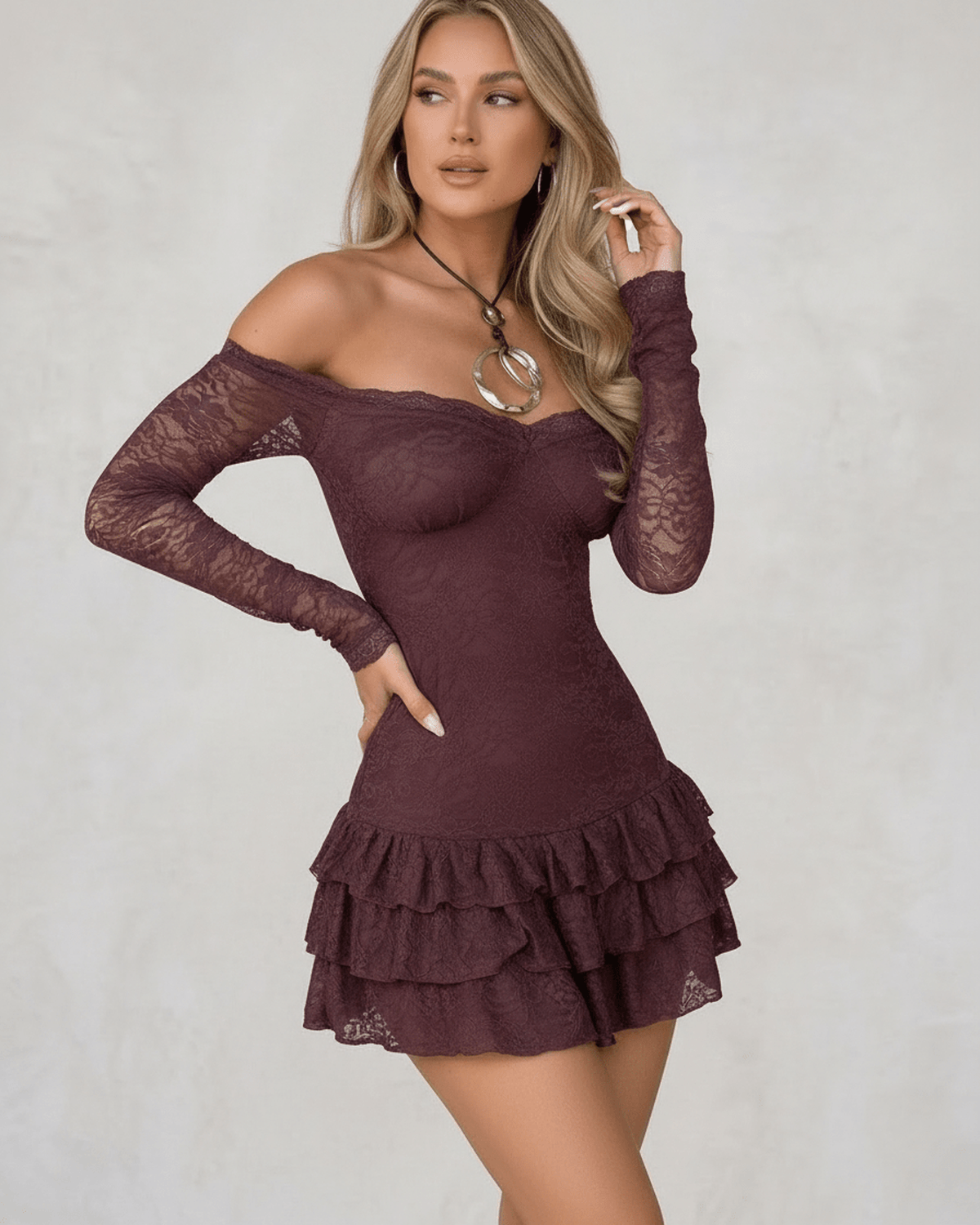 Celeste Mini Dress by Lauven in deep plum lace with ruffled hem and off-the-shoulder neckline.