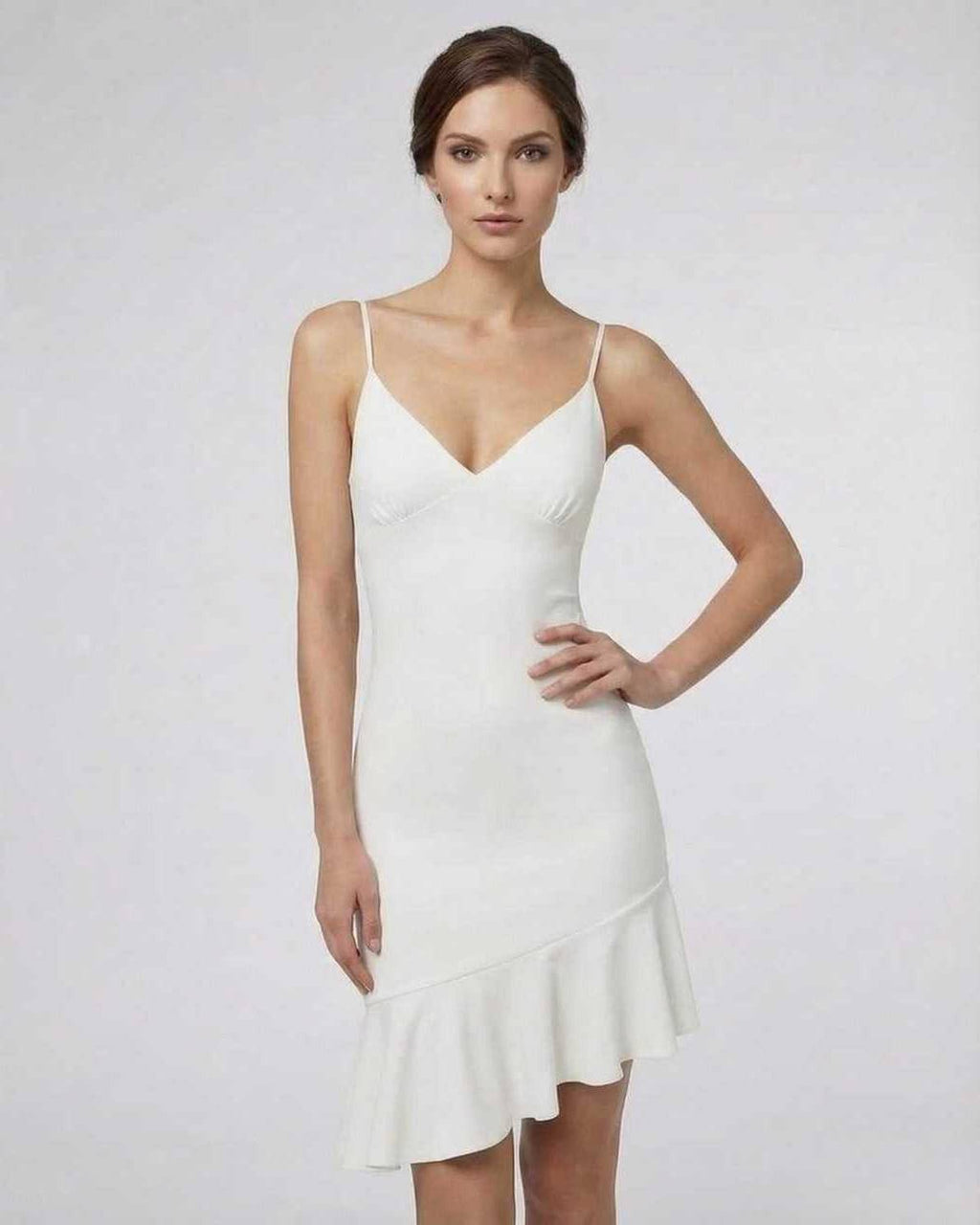 Celeste Mini Dress by Lauven, elegant white A-line dress with ruffle detail and comfortable fit.
