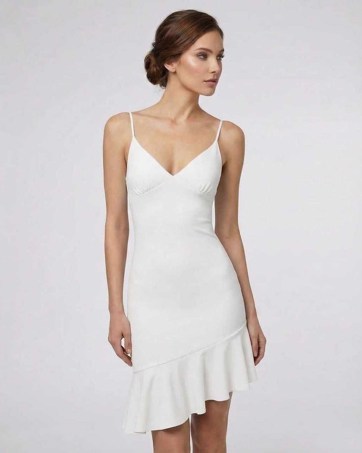 Celeste Mini Dress by Lauven featuring elegant white A-line design and ruffle detail.