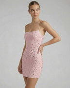 Celeste Mini Dress by Lauven in delicate pink with rhinestone embellishments, showcasing a sleek silhouette.