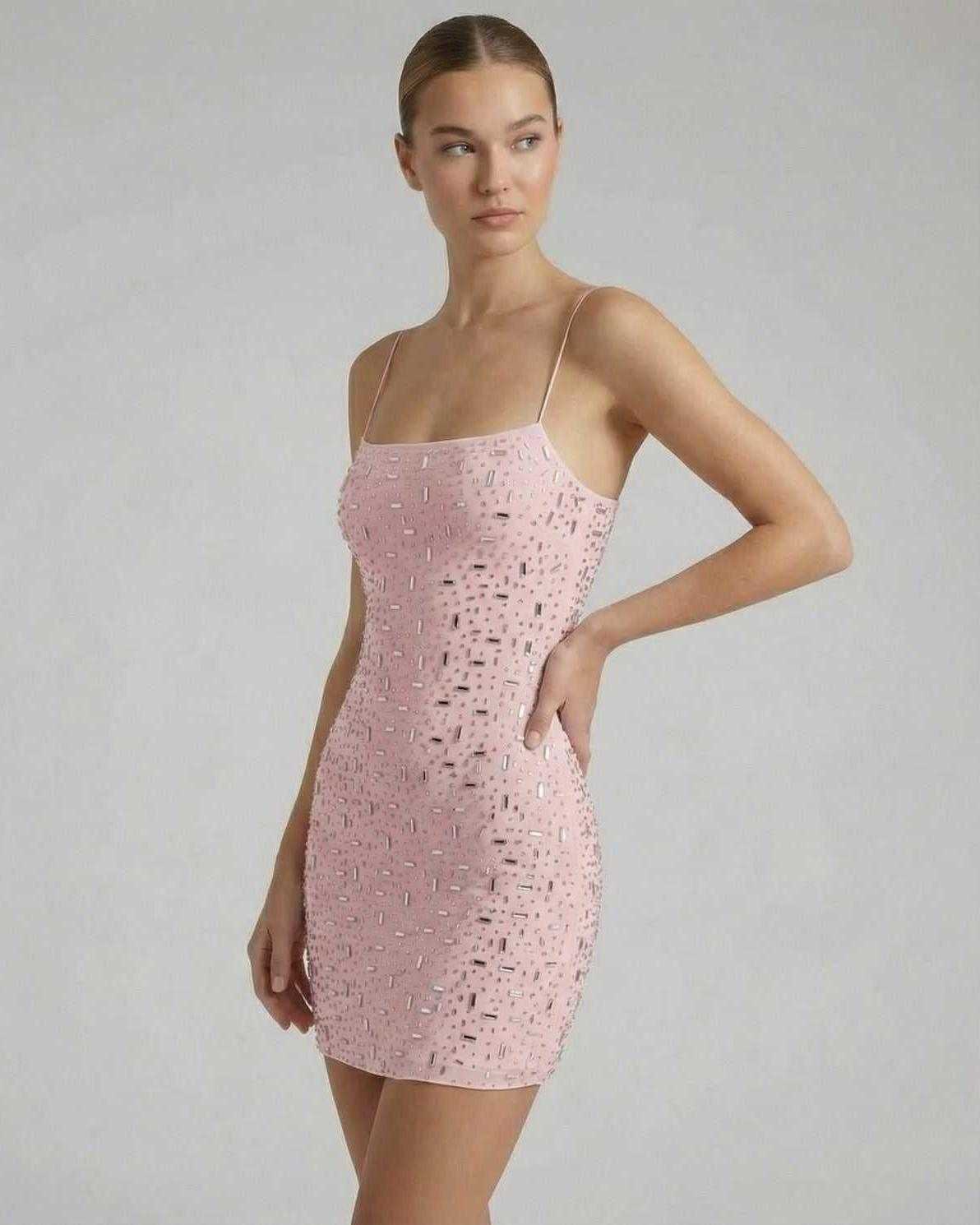 Celeste Mini Dress by Lauven in delicate pink with rhinestone embellishments, showcasing a sleek silhouette.