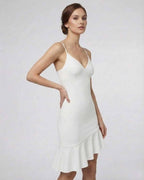 Celeste Mini Dress by Lauven featuring elegant white A-line ruffle detail, showcasing its sophisticated design.