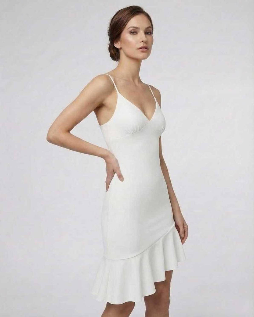Celeste Mini Dress by Lauven featuring elegant white A-line ruffle detail, showcasing its sophisticated design.