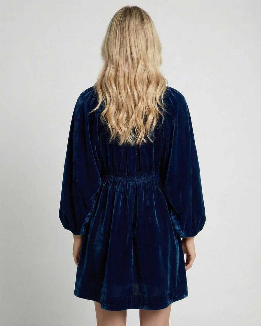 Celeste Mini Dress back view showing navy velvet fabric, long sleeves, and relaxed silhouette by Lauven.