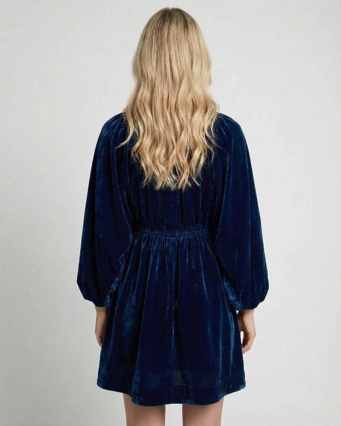 Celeste Mini Dress back view showing navy velvet fabric, long sleeves, and relaxed silhouette by Lauven.