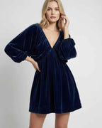 Celeste Mini Dress | Navy velvet mini dress with long sleeves and V-neck silhouette by Lauven, offering elegance and comfort.