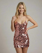 Celeste Mini Dress by Lauven, a rose gold sequin bodycon mini dress with spaghetti straps, perfect for evening wear.