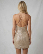 Celeste Mini Dress by Lauven, back view showcasing elegant sequin shine and crisscross straps.