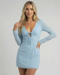 Celeste Mini Dress by Lauven in soft blue with V-neckline and sheer long sleeves, showcasing a sleek silhouette.