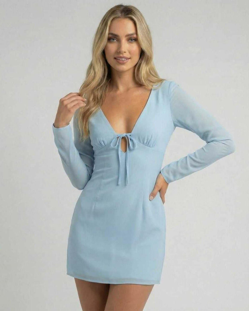 Celeste Mini Dress by Lauven in soft blue with V-neckline and sheer long sleeves, showcasing a sleek silhouette.