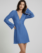 Celeste Mini Dress by Lauven in soft blue with pleated fabric and long flared sleeves