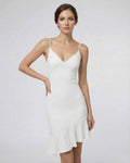 Celeste Mini Dress by Lauven, elegant white A-line design with ruffle detail, perfect for upscale fashion.