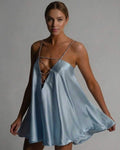 Celestial Mini Dress by Lauven in icy blue satin A-line silhouette with beaded straps and flared skirt.