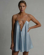 Celestial Mini Dress by Lauven in icy blue satin with flared skirt and beaded spaghetti straps.